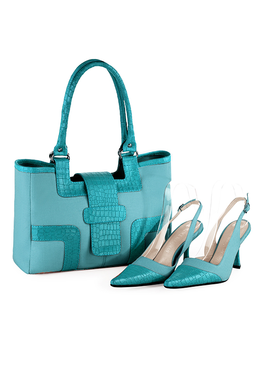 Aquamarine blue women's dress handbag, matching pumps and belts. Top view - Florence KOOIJMAN